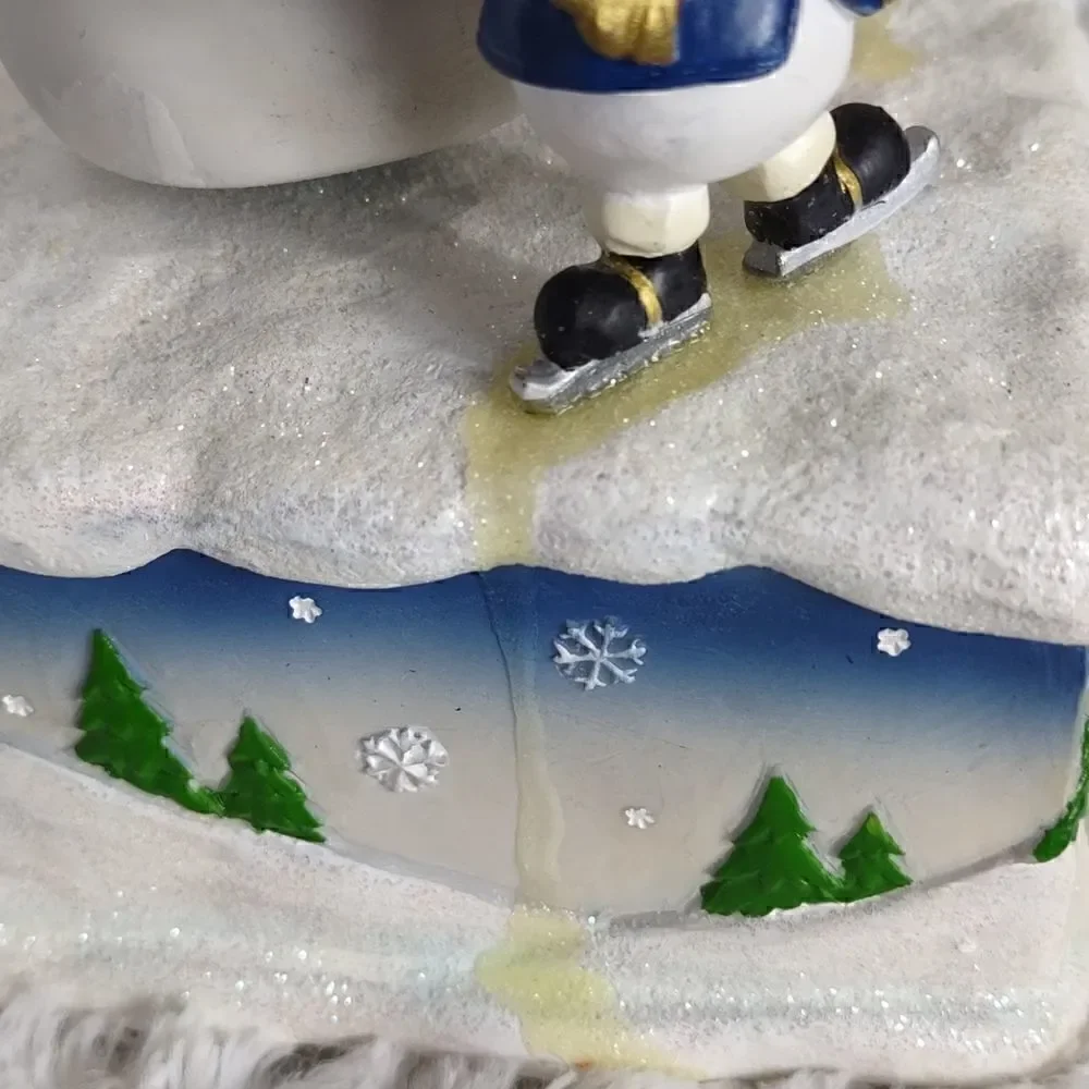 Musical Snowman Family Spinning Figurine